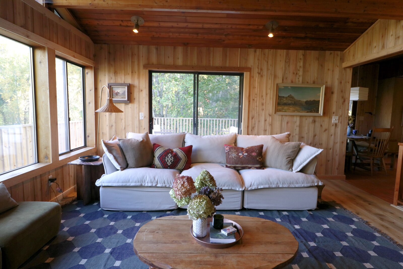 Living room with stone fireplace